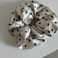 Elegant white satin scrunchie with black heart pattern for hair styling and accessories - Milk Tea with Black Heart