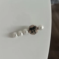 Detailed view of hair clip with faux pearls and brown check pattern fabric button - Milk Tea Striped Four Pearl Alligator Clip (11#)
