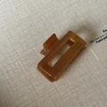 Detailed macro view of the amber tortoise shell acetate hair claw with Barrette La France text - 5# Tortoiseshell Square Claw Clip