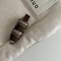 Close-up of a British retro plaid hair clip featuring brown fabric on a beige canvas surface - Coffee Plaid Water Drop Hair Clip