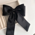Elegant large black satin bow hair clip with long ribbons for minimalist women's hair styling - Hair Bow / Black