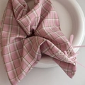 Close-up of pink plaid fabric accessory with floral lace edges and silky satin bows - Hair Tie / Pink Plaid