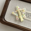 Cute star-shaped hair clip with colorful polka dots on a cream resin finish - Milky White