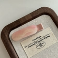 Dettaglio di un fermaglio per capelli in acetato rosa marmorizzato con glitter fini - Fermaglio Capelli Ovale Rosa (4#)