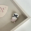 Polka dot hair clip with black and pink ribbons on a textured decorative tray - White Black Polka Dot Water Drop Double Bow