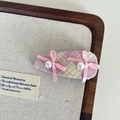 Close-up of pink plaid BB hair clip with ribbon bows and pearls on a wooden tray - Pink Plaid Double Bow Hair Clip