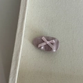 Detail of pink bow hair clip featuring a textured oval resin base and satin ribbon design - Purple Clip Pink Bow