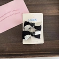 Pair of black plush ballet style bow hair clips with white ribbons and black heart charms - Black Bowknot Black Heart Hair Clip (Pair)