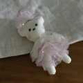 Detailed view of handmade plush bear charm with pink lace bow and ruffled tulle skirt - Pink Skirt White Rabbit Hair Clip