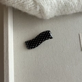 Elegant black polka dot acrylic hair clip with a smooth glossy finish on canvas background - Black Wave White Dot Clip