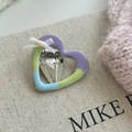 Detail of heart hair clip with colorful enamel finish and white lace bow decoration - Hollow Heart Hair Clip with Bow (5#)