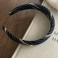 Detail of handmade striped fabric headband with geometric patterns and gold metal button - Black Striped Headband