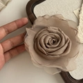 Detailed close-up of a Morandi brown layered mesh rose hair claw clip with chiffon petals - Milk Tea Flower Hair Tie (2#)