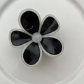 Glossy black and white flower hair claw clip with a sleek resin finish for women - Black Flower With White Edge Claw Clip