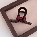 Close-up of tortoise shell hair claw clip with a red France Handmade bow detail - Wine Red Bow Small Cross Claw Clip