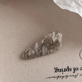 Detailed macro view of acetate hair clip with grey marble pattern and engraved handmade text - 3# Gray Texture
