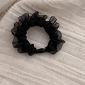 Detail of black mesh scrunchie with organza pleats and polished cylinder charm - Black