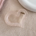 Gros plan d'une pince à cheveux en forme de cœur rose tendre translucide avec ressort - Style Cœur Rose (7#)