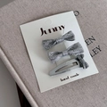 Lot de trois barrettes à paillettes argentées avec nœud pour filles sur carte cadeau - Ensemble Nœud Argenté