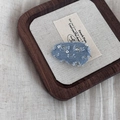 Denim bow hair clip with silver stars and frayed edges on a vintage canvas background - Light Denim Waterdrop Clip