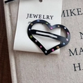 Schwarze Herz-Haarklammer mit bunten Punkten auf einer Schmuck-Displaykarte - Schwarz Herz Punkte Haarklammer