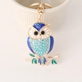 Portachiavi a forma di gufo blu con placcatura in oro e strass azzurri brillanti - Blu