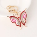 Sparkling pink and red butterfly keychain with rhinestones and golden metal hardware - Pink