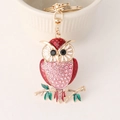 Portachiavi a forma di gufo dorato con cristalli rosa e rossi e chiusura a moschettone - Rosa