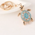 Golden turtle keychain with sky blue rhinestones and lobster clasp for bags and keys - Blue