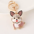 Portachiavi Corgi in lega dorata con strass rosa e bianchi e finitura smaltata - Rosa