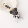 Sparkly grey crystal bear keychain with letter V charm and gold-tone hardware - Gray