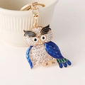 Portachiavi a civetta in oro con smalto blu e verde e brillanti strass incastonati - Blu