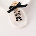 Portachiavi panda con fiocco in velluto nero e cinturino con perle finte bianche - Nero
