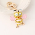 Porte-clés abeille créatif avec cristaux jaunes et émail rose en finition dorée - Rose