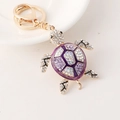 Golden turtle keychain with purple crystals and sparkling rhinestones for car keys - Purple