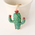 Portachiavi cactus con strass blu scintillanti con smalto verde e anello dorato - Rosso