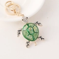 Golden turtle keychain with green enamel shell and sparkling crystals for women - Green