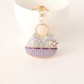 Porte-clés de sac en fleurs de cristal avec strass violets et blancs sur placage doré - Violet