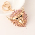 Golden alloy bull head keychain with pink rhinestones and a metal ring accessory - Pink
