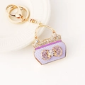 Mini lavender handbag keychain with sparkling rhinestones and golden lobster clasp - Purple