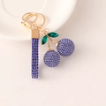 Creative cherry keychain with sparkling blue rhinestones and gold alloy lobster clasp - Blue