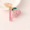 Pink rhinestone cherry keychain with gold metal clasp and sparkling leaf charm - Pink