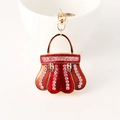 Portachiavi borsa in smalto rosso con cristalli rosa e chiusura dorata - Borgogna