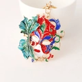 Porte-clés masque vénitien vintage en émail rouge, bleu et vert avec finition dorée - Rouge