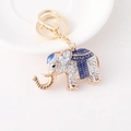 Llavero de elefante dorado con diamantes de imitación blancos y detalles de esmalte azul - Azul