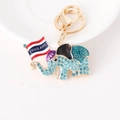 Porte-clés éléphant Thaïlande coloré avec strass bleus et breloque drapeau - Bleu