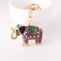 Exotic elephant keychain with purple rhinestones and colorful enamel on white cup - Purple