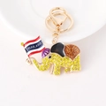 Porte-clés éléphant doré avec strass jaunes et breloque drapeau de la Thaïlande - Jaune