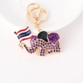 Porte-clés éléphant thaïlandais doré orné de strass violets et drapeau thaï - Violet