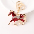 Portachiavi cavallo zodiacale dorato con smalto rosso e strass bianchi brillanti - Rosso